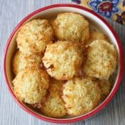 Keto coconut macaroons served in a bowl with a napkin.