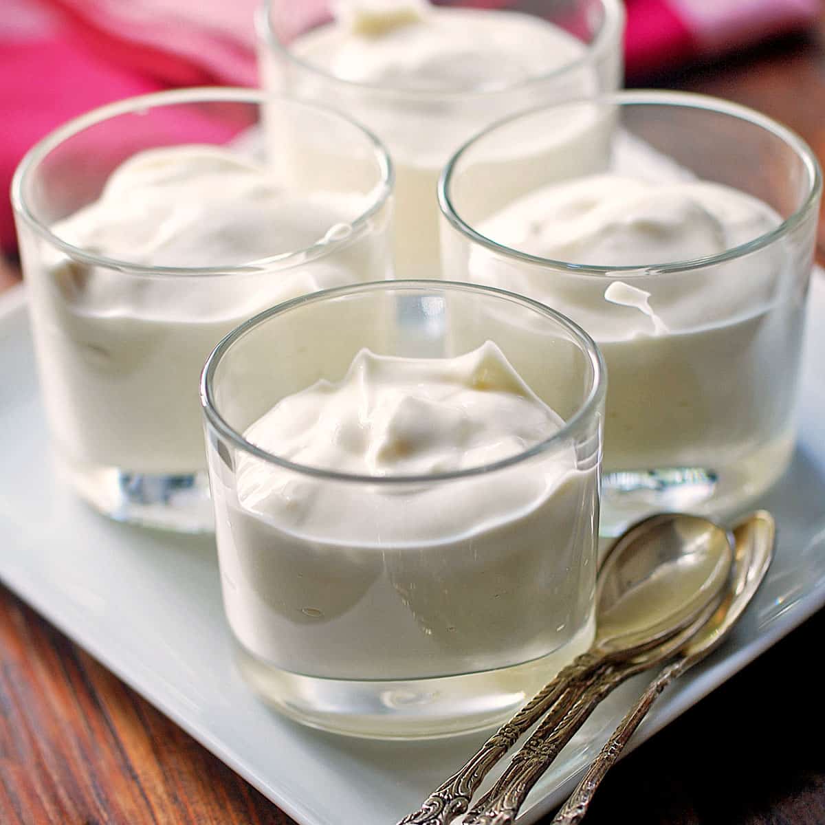 Ricotta Dessert served in glass cups with spoons.
