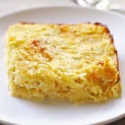 Spaghetti squash casserole served on a white plate.