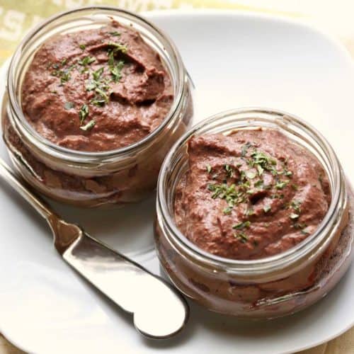 Chicken liver pate served in glass containers.