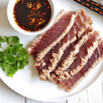 Seared tuna, sliced and served with a dipping sauce.