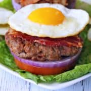 Bacon burger topped with a fried egg.
