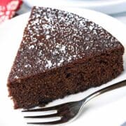 Almond flour chocolate cake served with a fork.