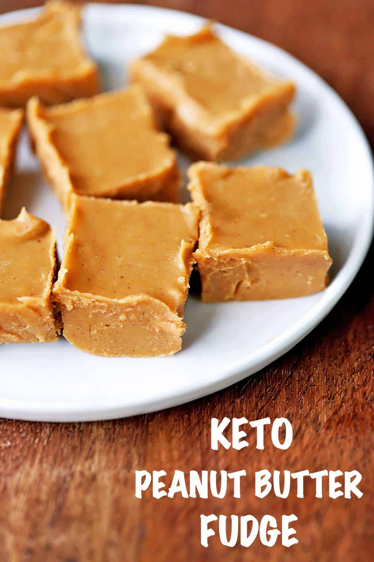 Keto peanut butter fudge squares served on a white plate.