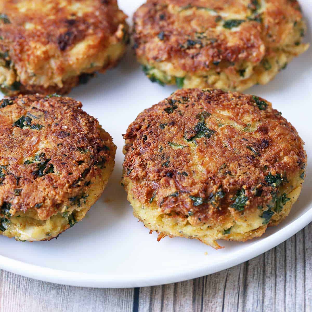 Keto crab cakes served on a white plate.