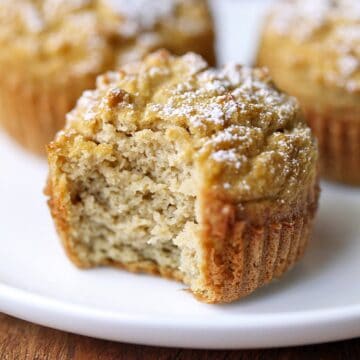 Coconut flour muffins served on a white plate.