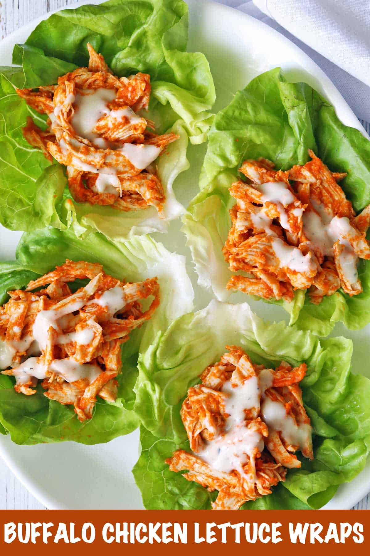 Buffalo chicken lettuce wraps served on a plate.