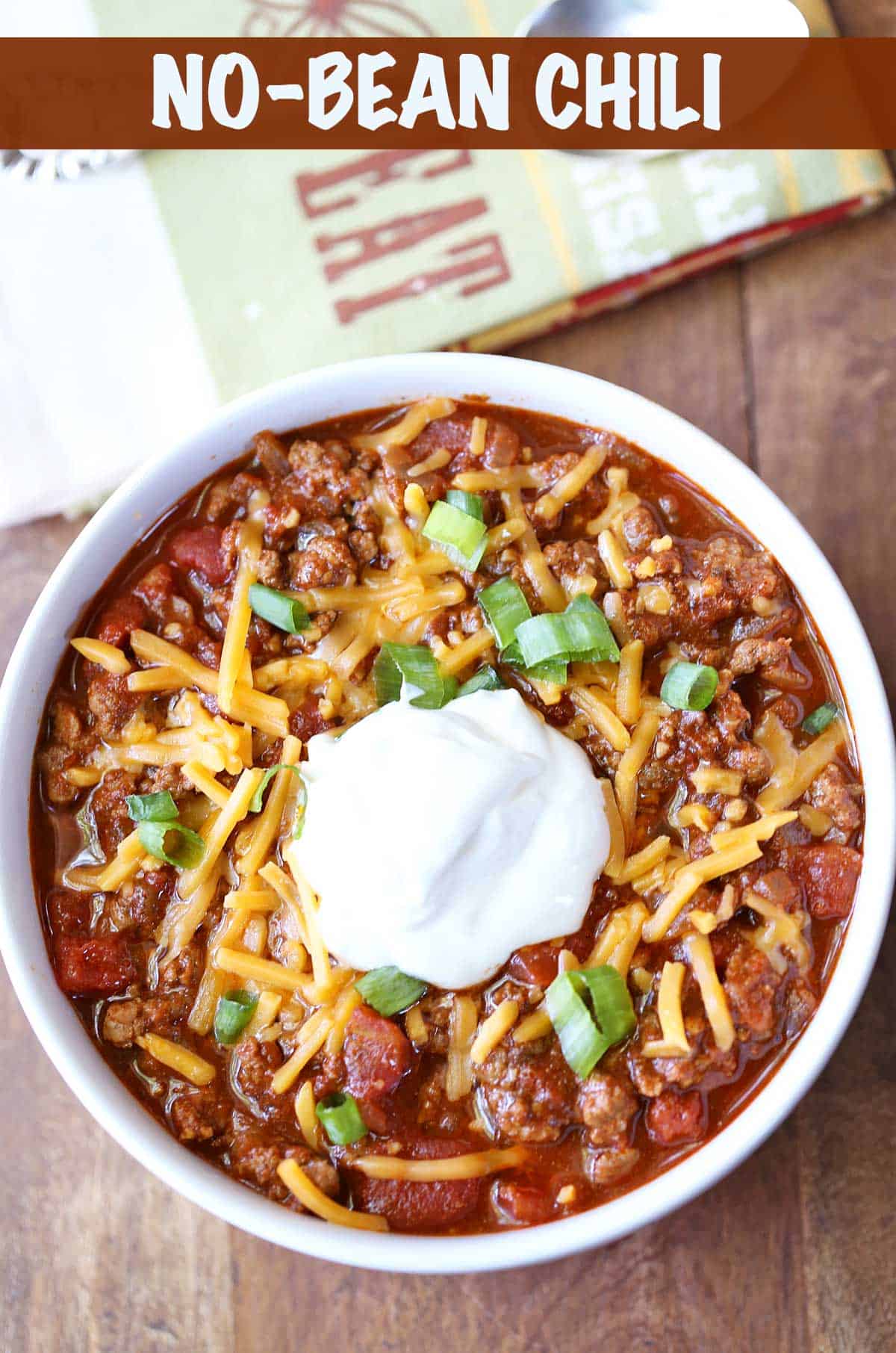 No-bean chili served in a bowl, topped with sour cream. 
