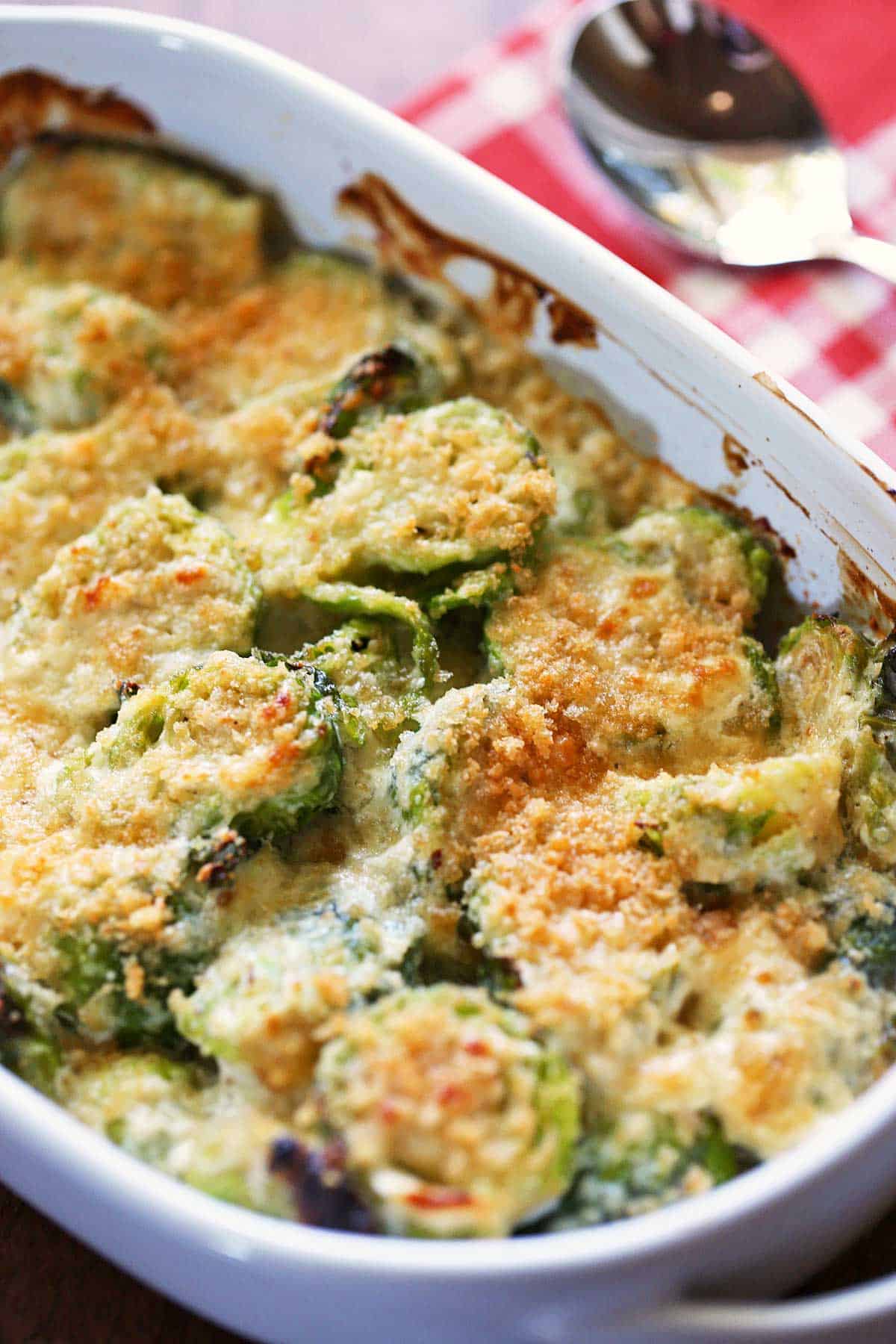 Brussels Sprouts Casserole in a white baking dish.