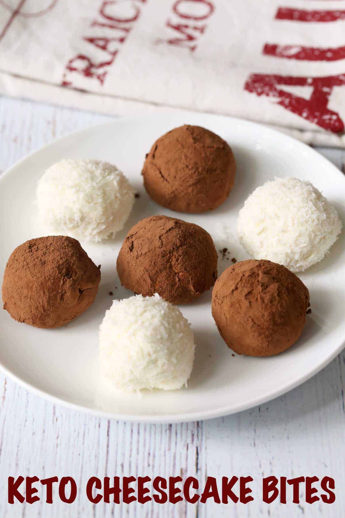 Keto cheesecake bites coated with cocoa powder and shredded coconut.