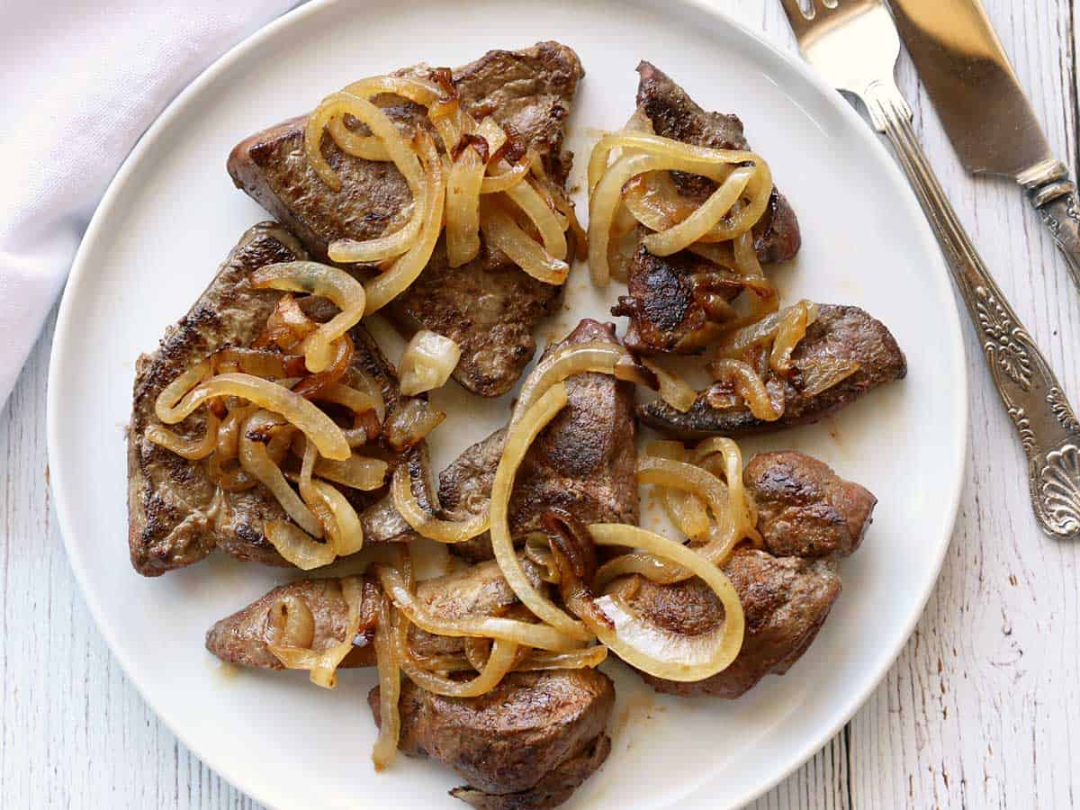 Sauteed beef liver slices topped with caramelized onions.