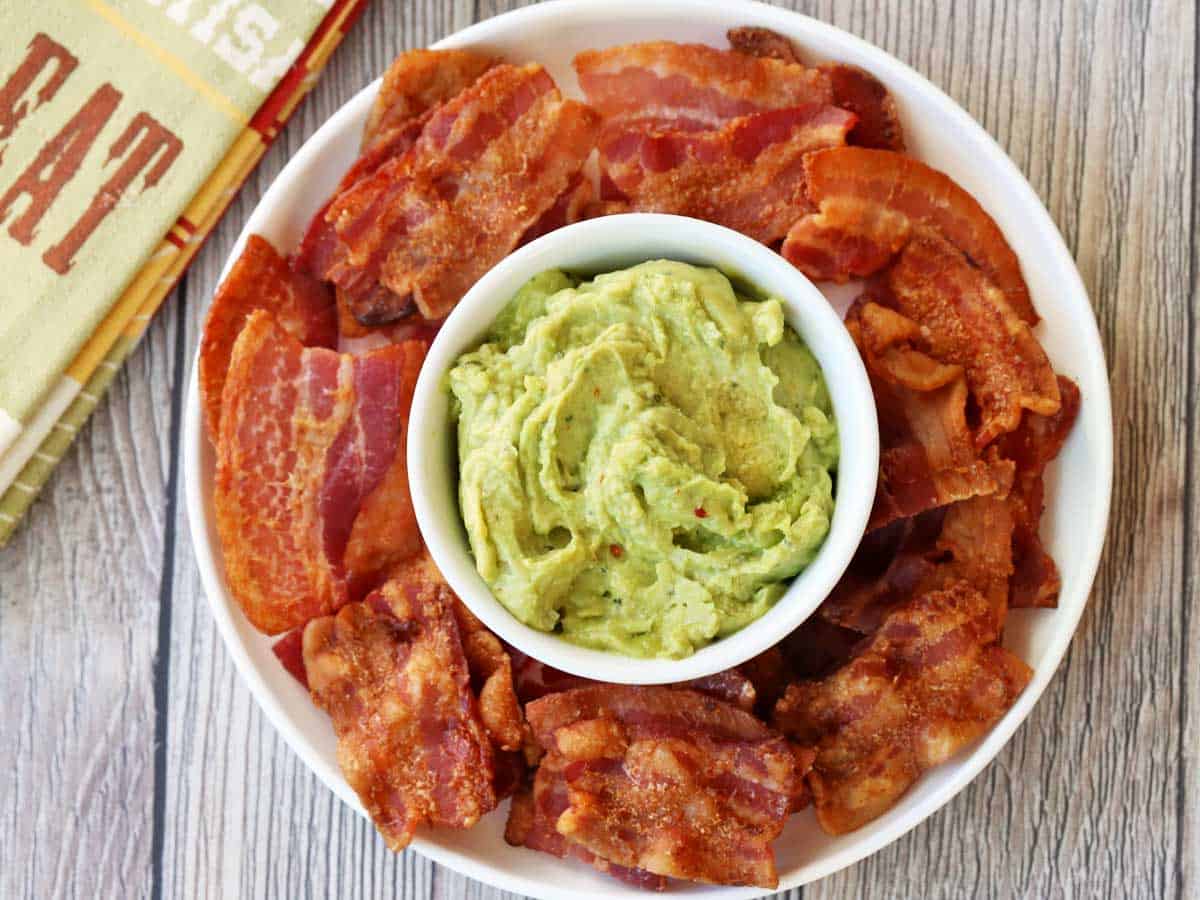 Bacon chips served with guacamole.