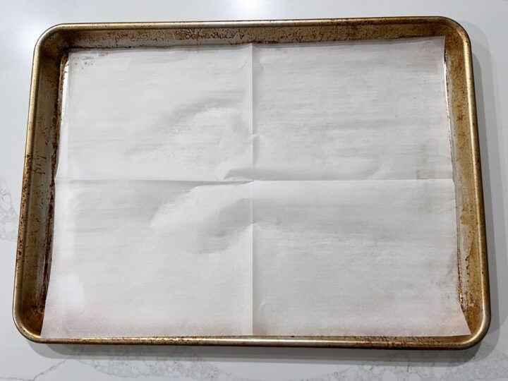 Parchment-lined baking sheet.