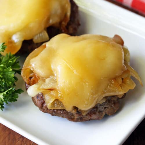 Broiled hamburgers topped with melted cheese.