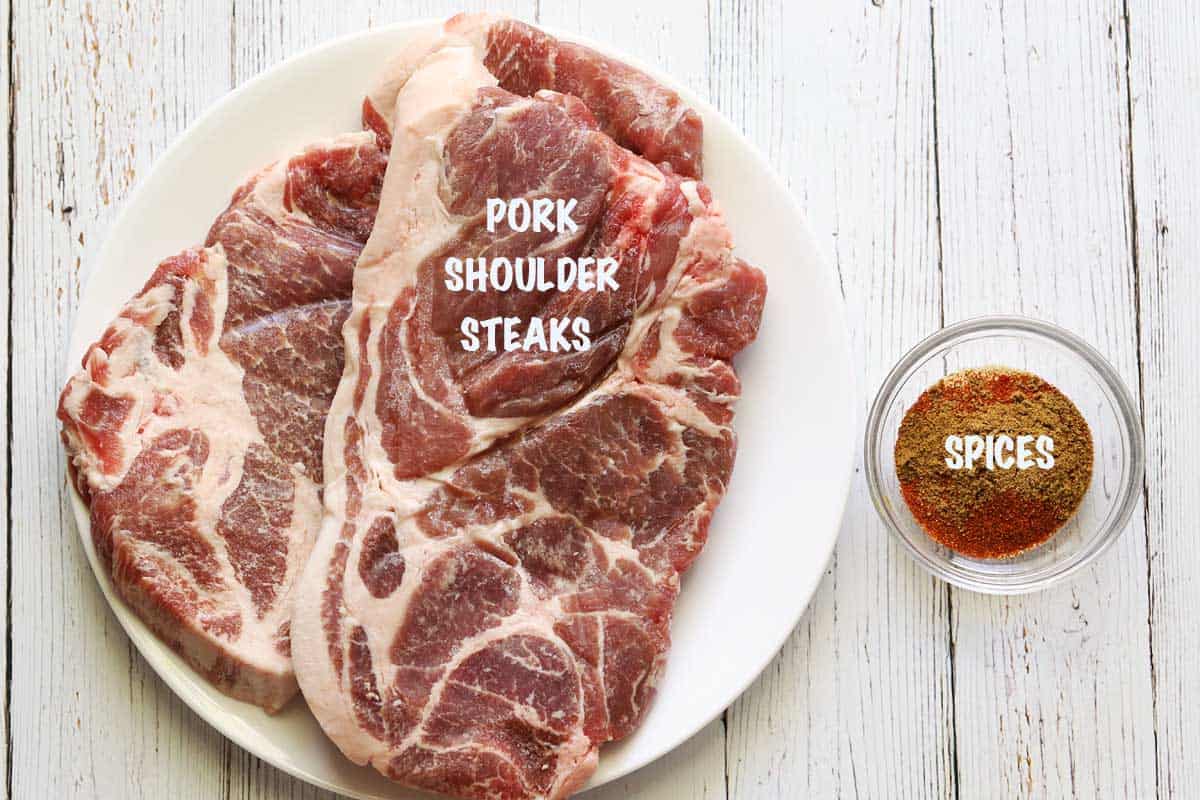 A photograph of the ingredients needed to make pork shoulder steaks. 