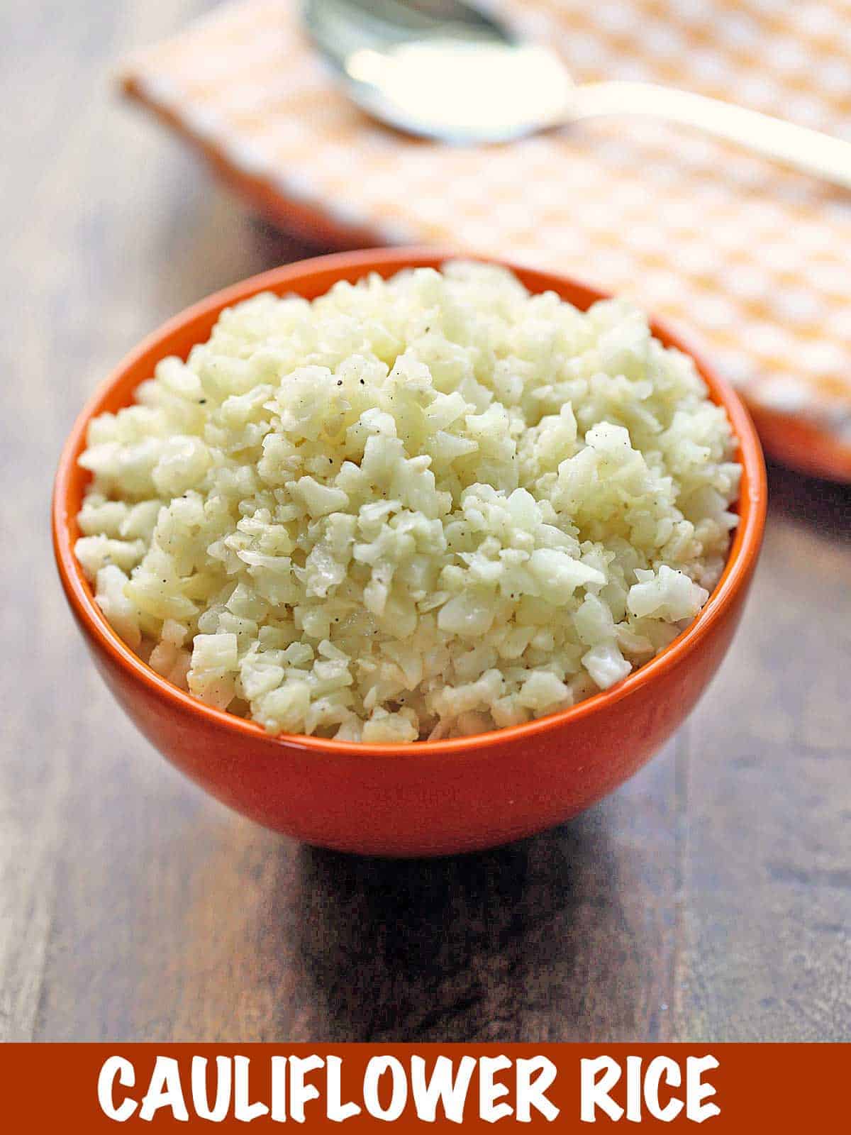 Cauliflower rice served in a bowl with a spoon and a napkin. 