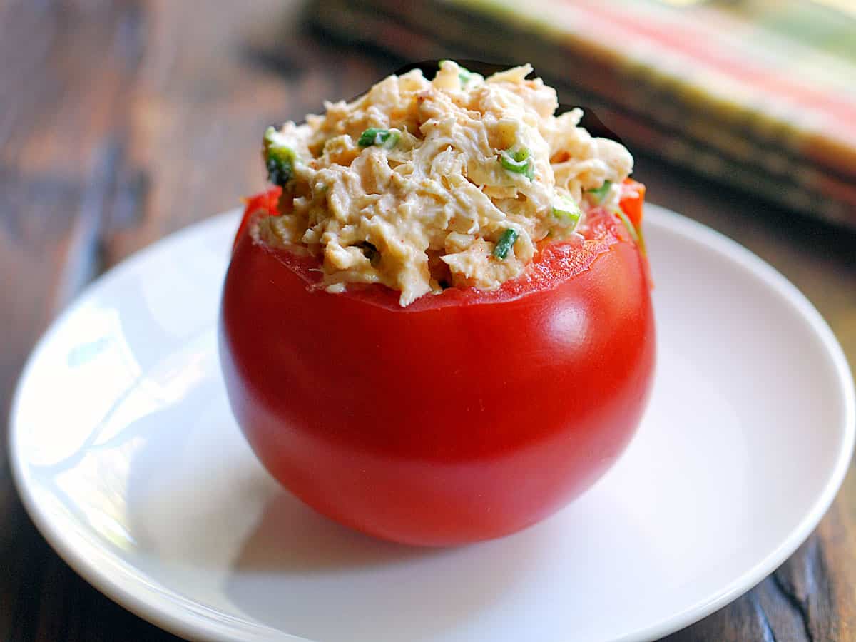Tuna salad stuffed inside a tomato. 