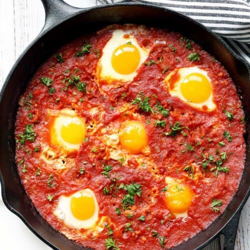 Shakshuka is served in a cast-iron skillet.