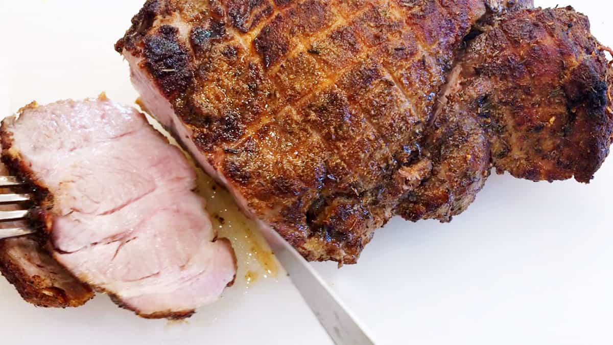 Slicing the cooked roast. 