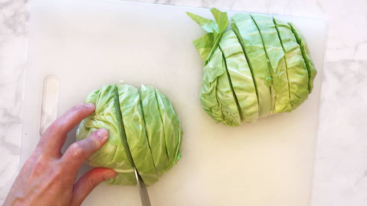 Cutting cabbage into wedges. 