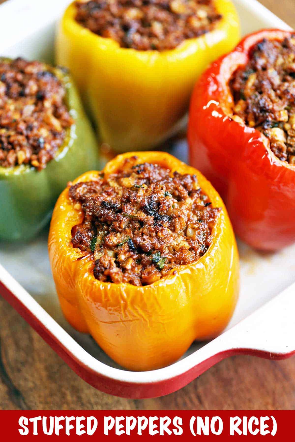 Stuffed peppers without rice served in a white baking dish.