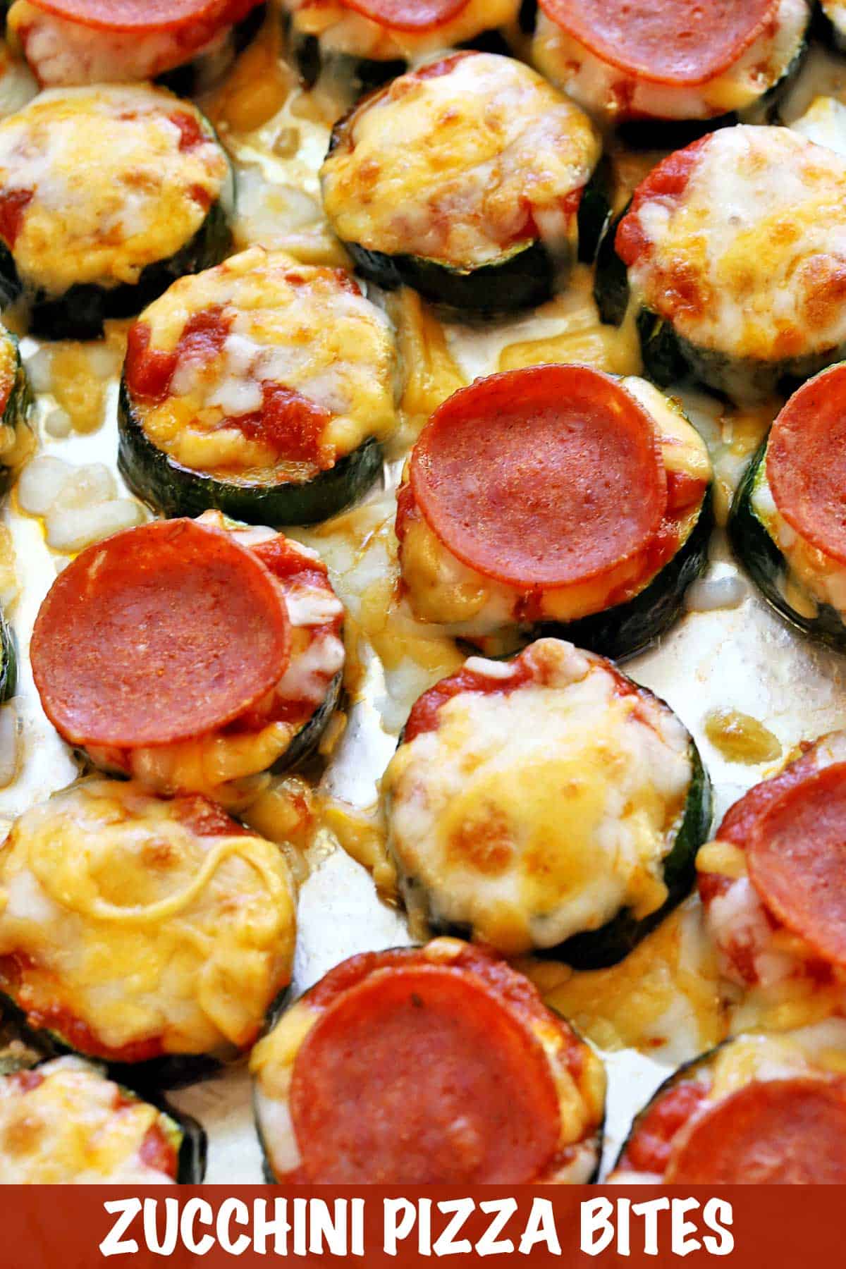 Close Up of zucchini pizza bites served on a baking sheet. 