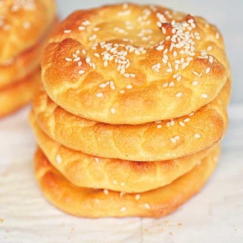 Cloud bread, stacked, topped with sesame seeds.