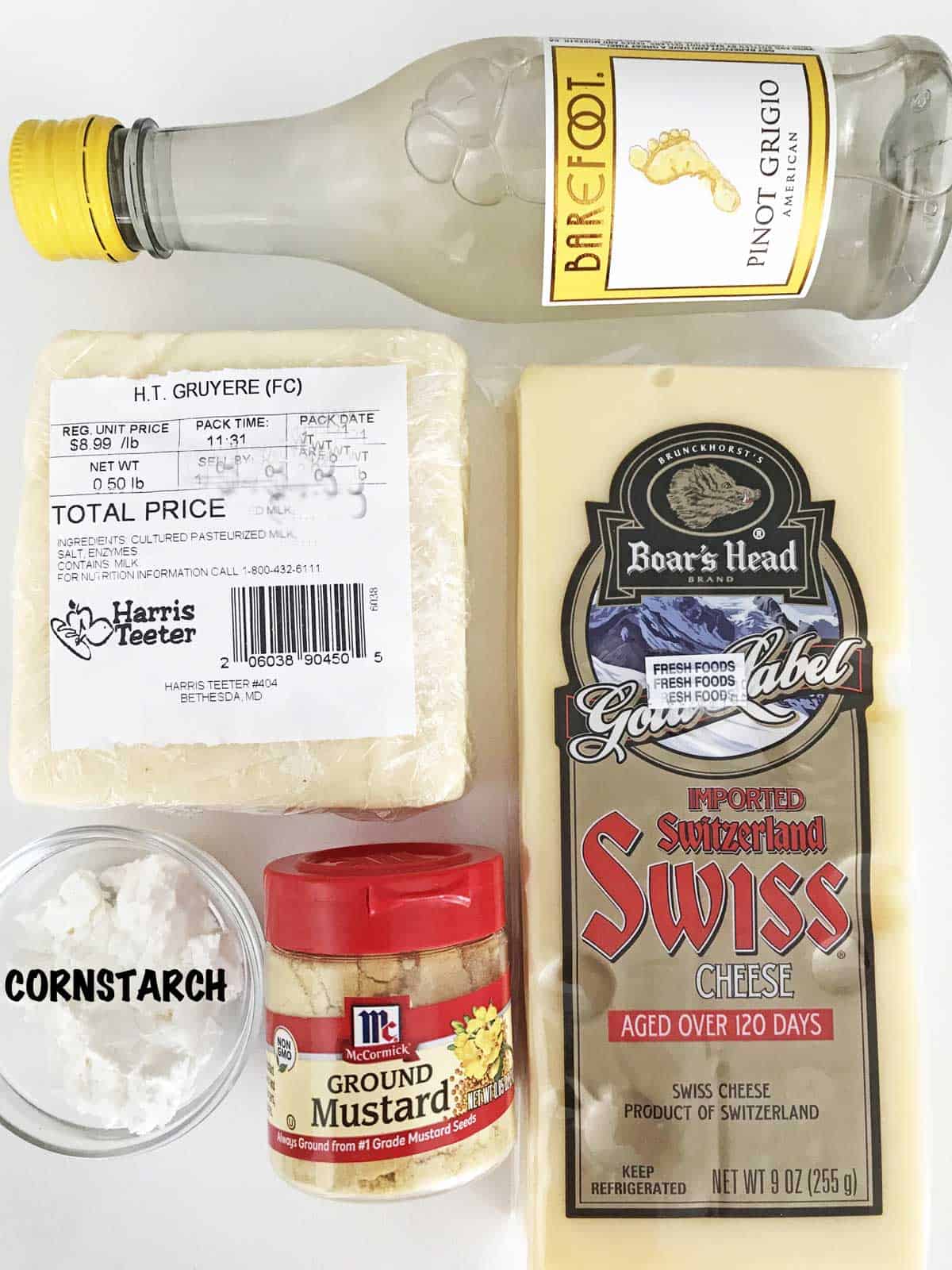 The ingredients needed to make cheese fondue.