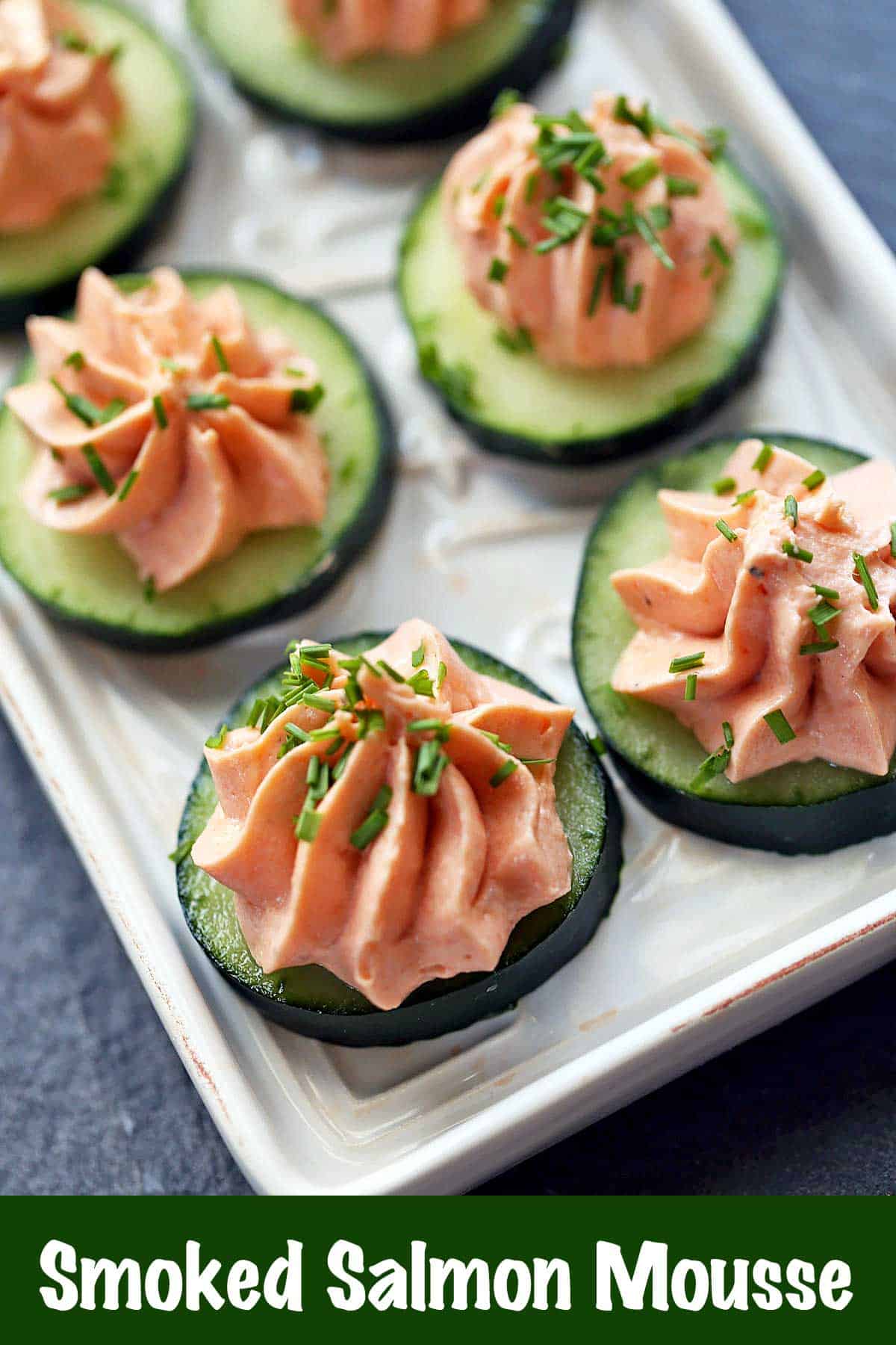 Salmon mousse served on top of cucumber slices. 