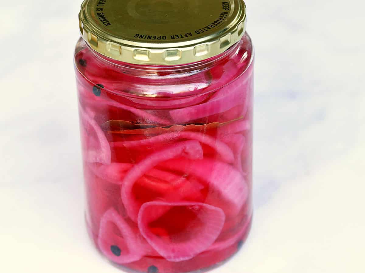 Pickled red onions in a jar. 