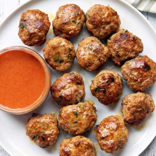 Turkey meatballs served with a dipping sauce.