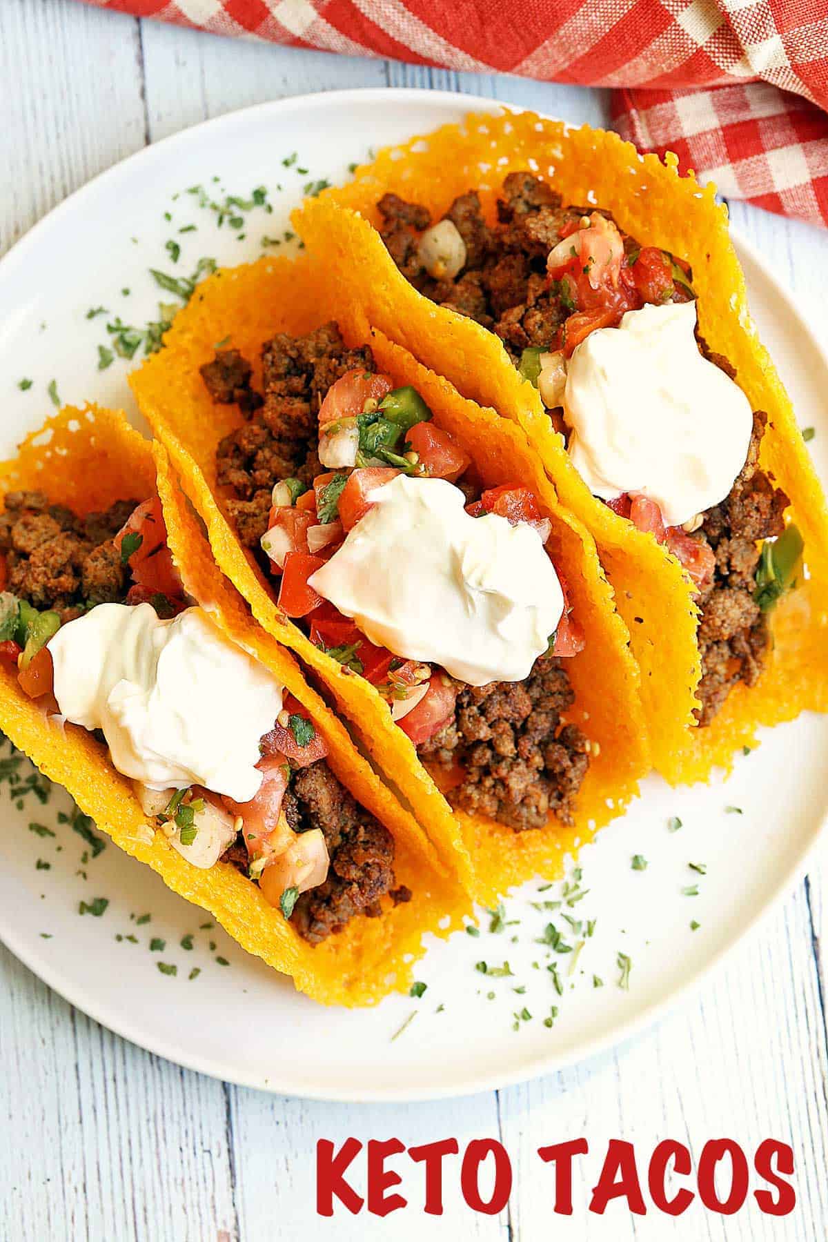 Low-carb tacos served on a white plate with a red napkin. 