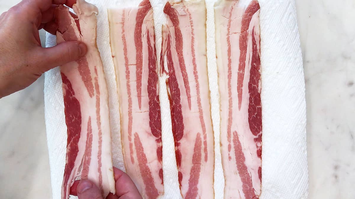 Place bacon slices on paper towels.