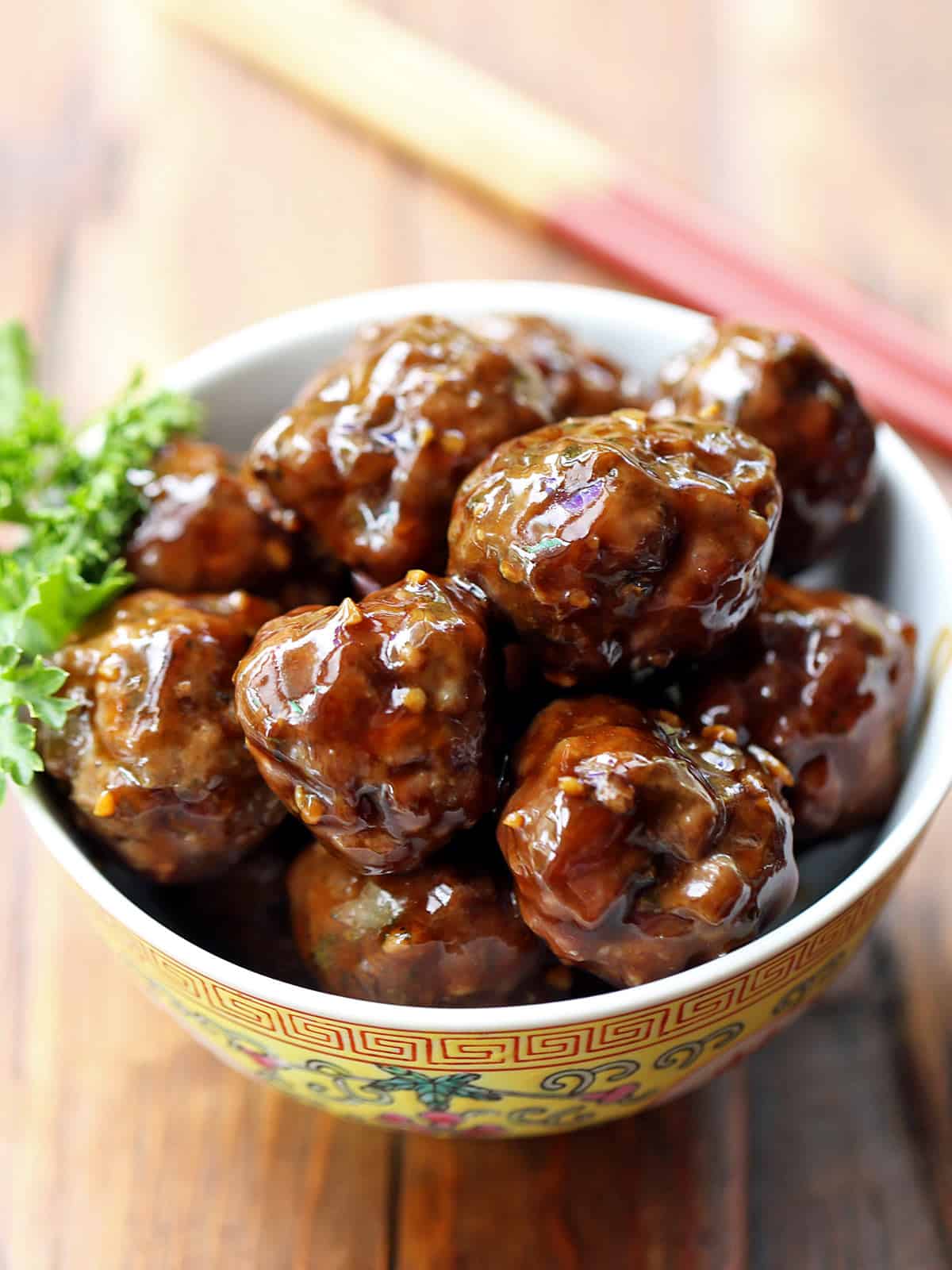 Asian meatballs served in a Chinese bowl. 