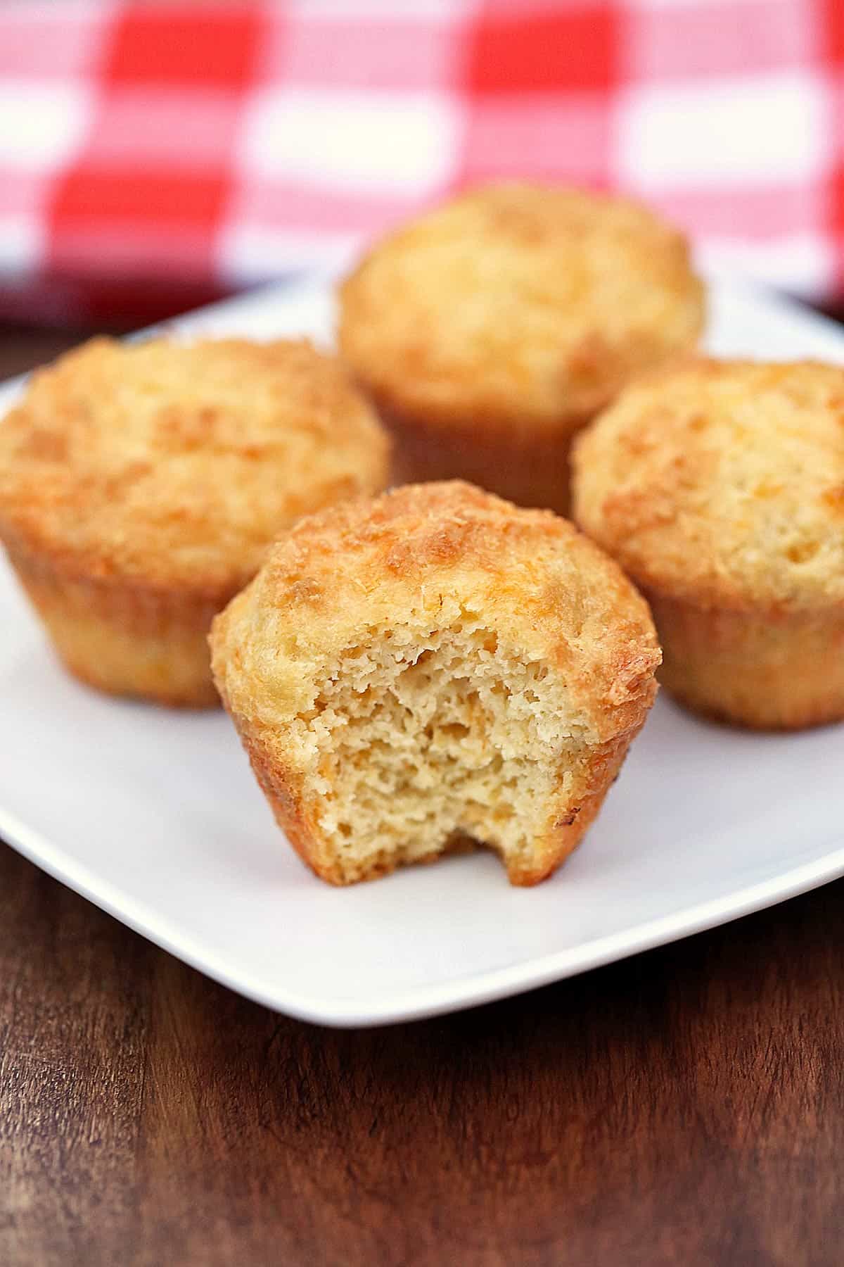 Keto cheese muffins served on a white plate. 
