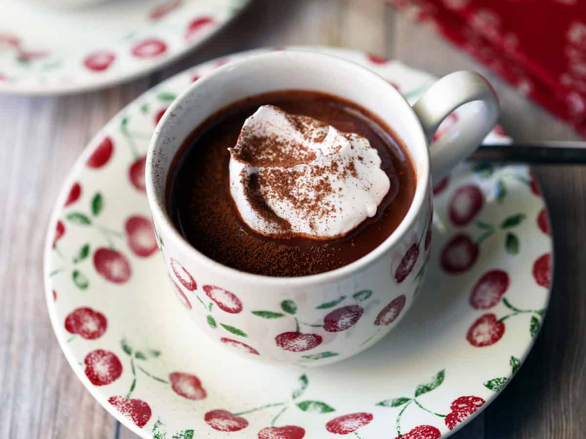 Keto hot chocolate topped with whipped cream. 