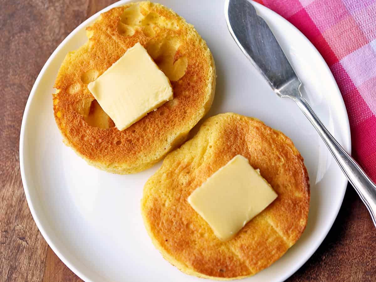 Low carb keto English muffin served with butter. 