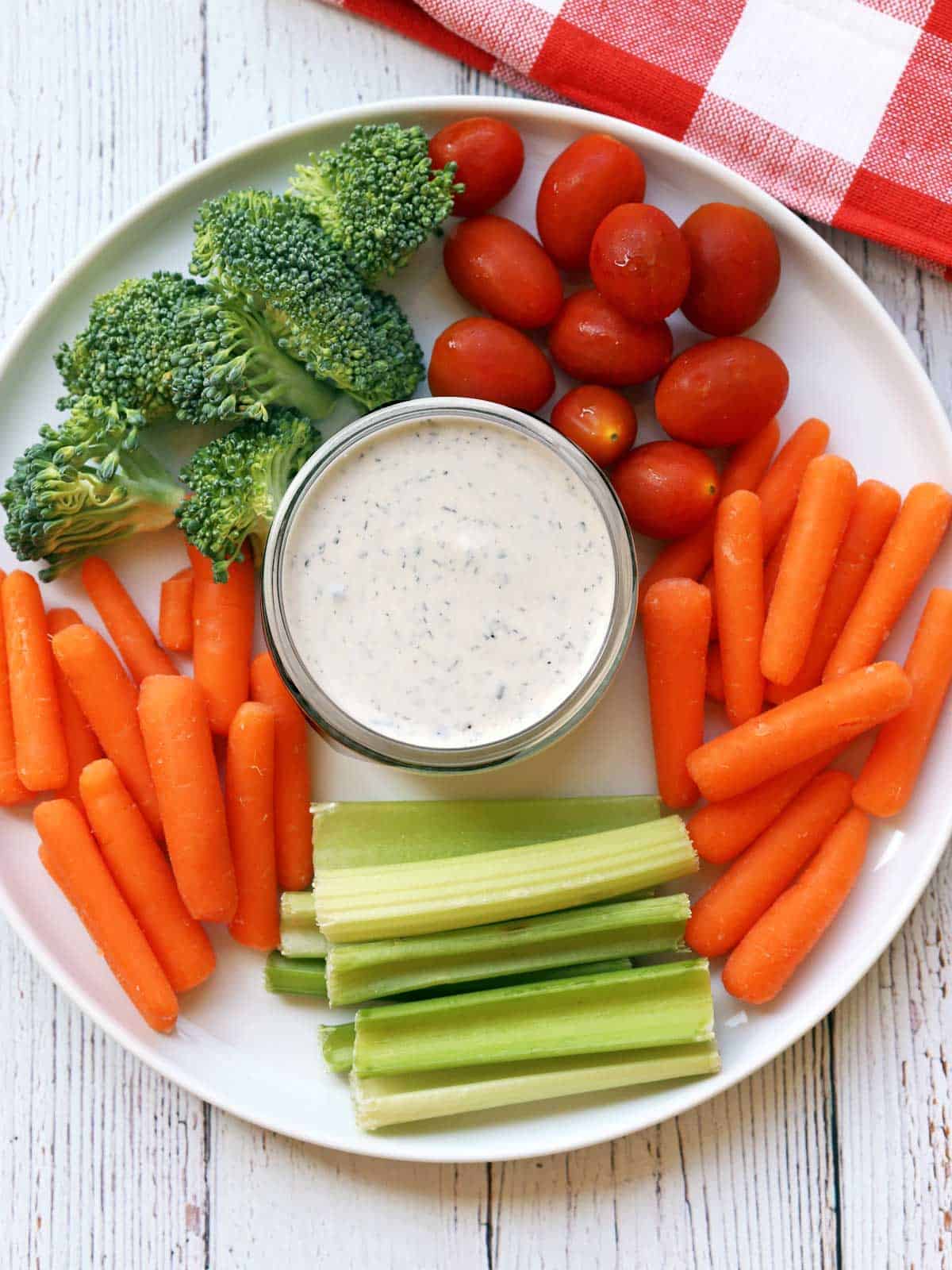 Ranch dressing served with vegetables. 