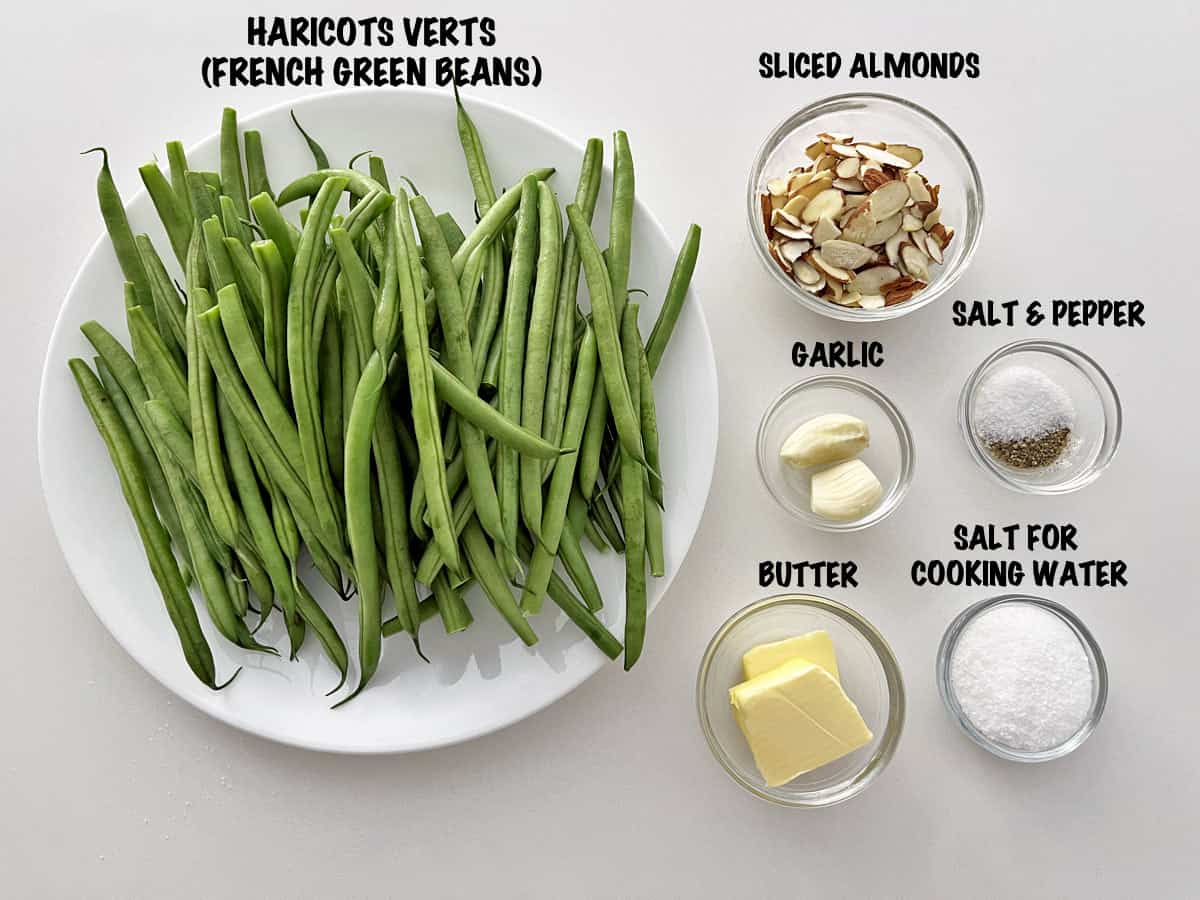 The ingredients needed to make green beans almondine.