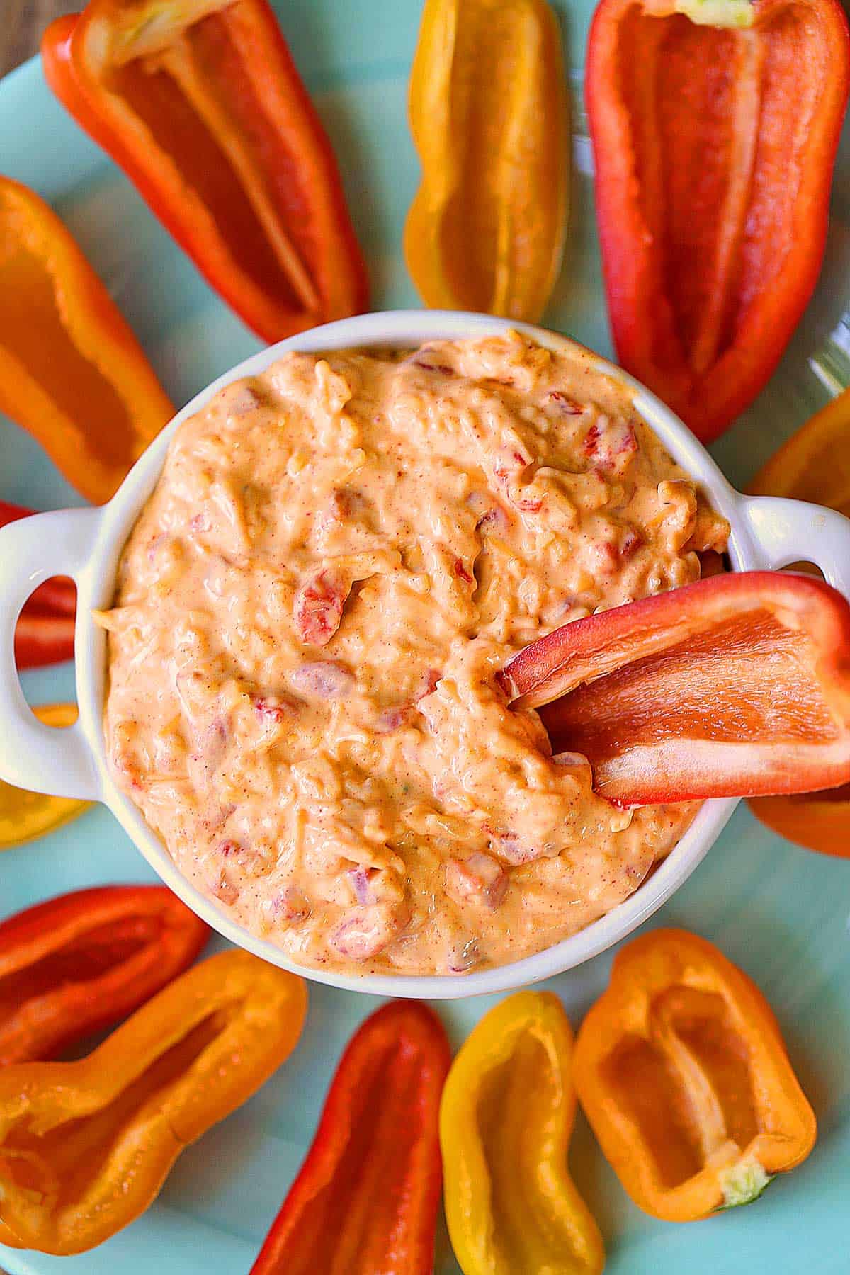 Homemade pimento cheese served with fresh vegetables for dipping. 