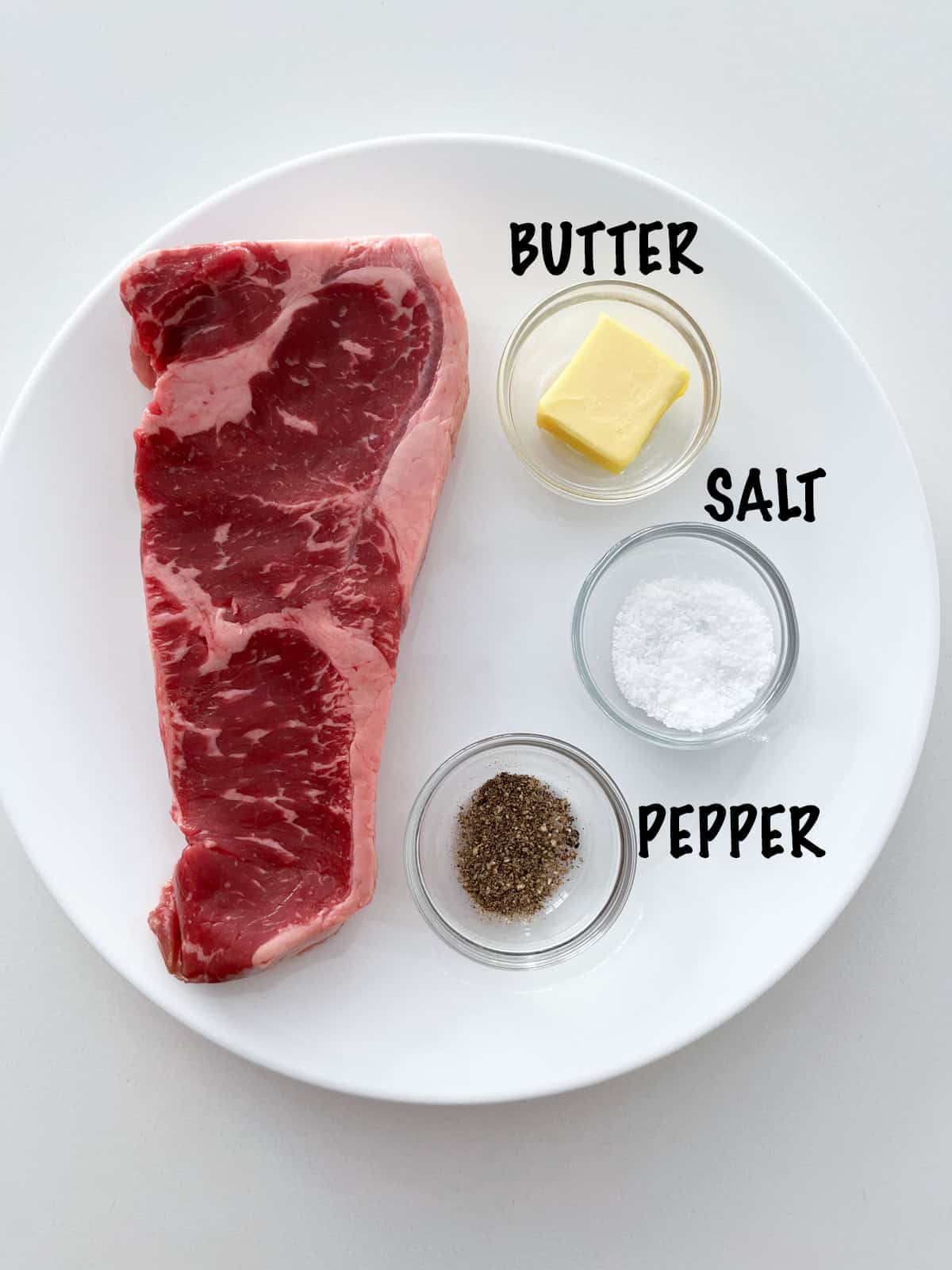 The ingredients needed to cook a reverse-seared steak. 