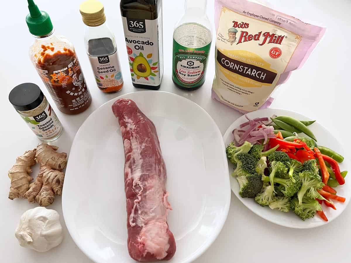 The ingredients needed to make a pork stir-fry. 