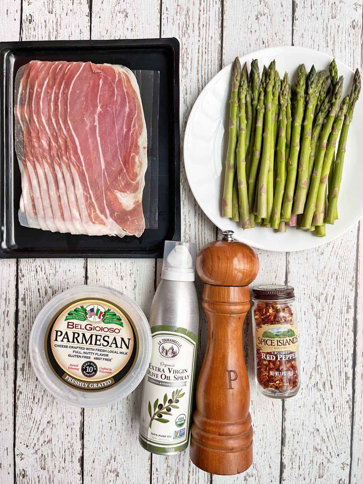 The ingredients needed to make  prosciutto-wrapped asparagus. 