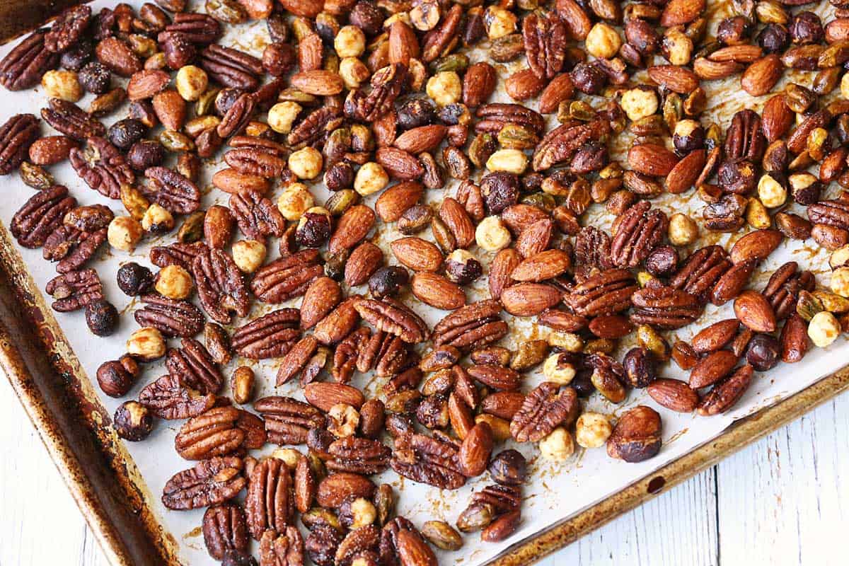 Honey-roasted nuts on a baking sheet. 