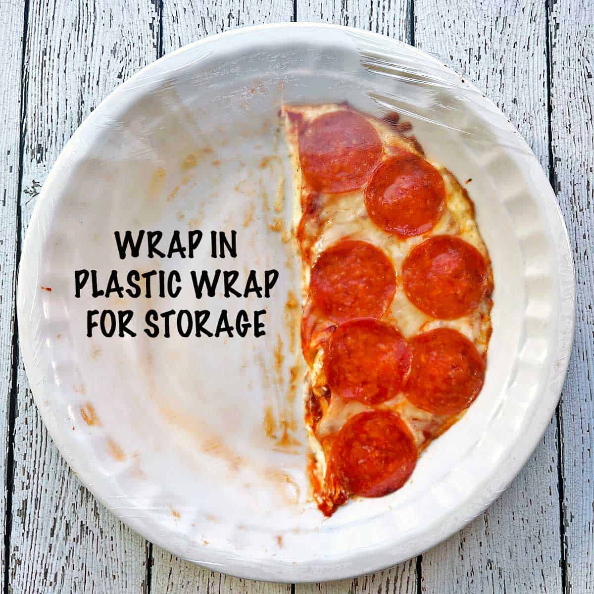 Leftover pizza dip wrapped in plastic wrap for storage. 