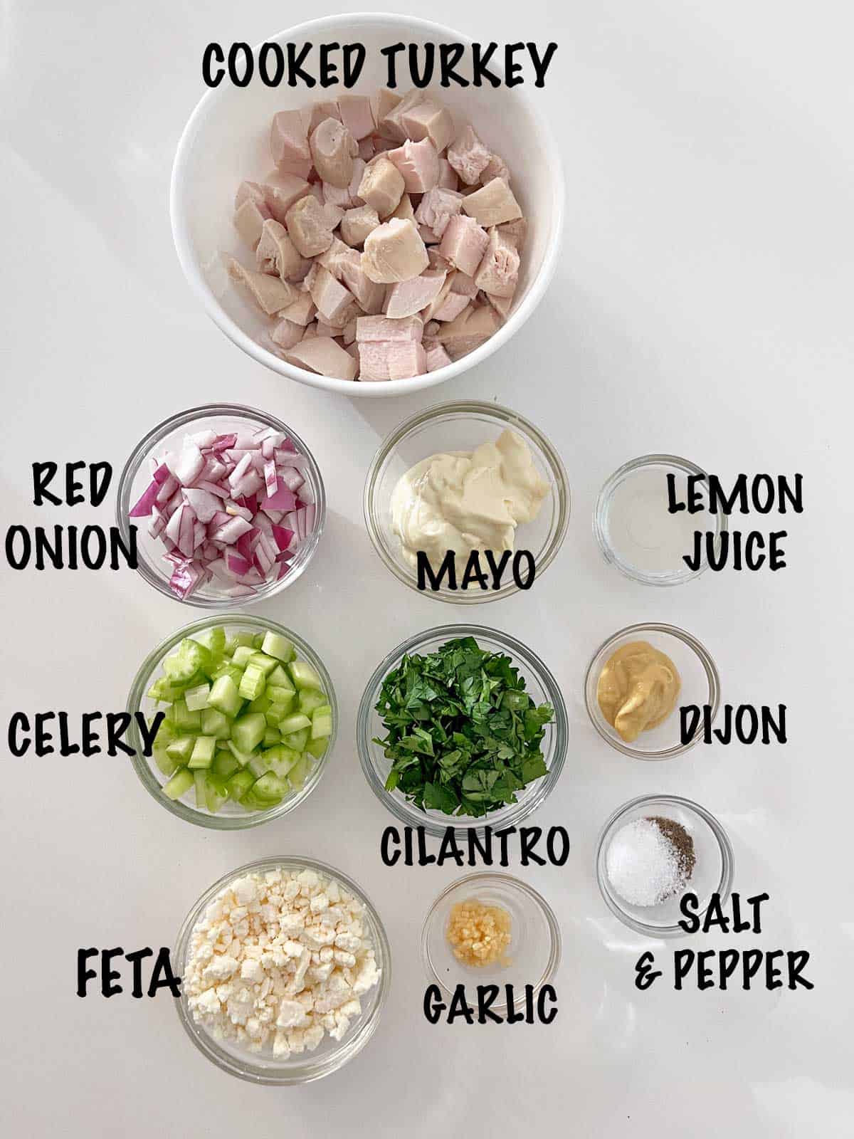The ingredients needed to make a turkey salad. 