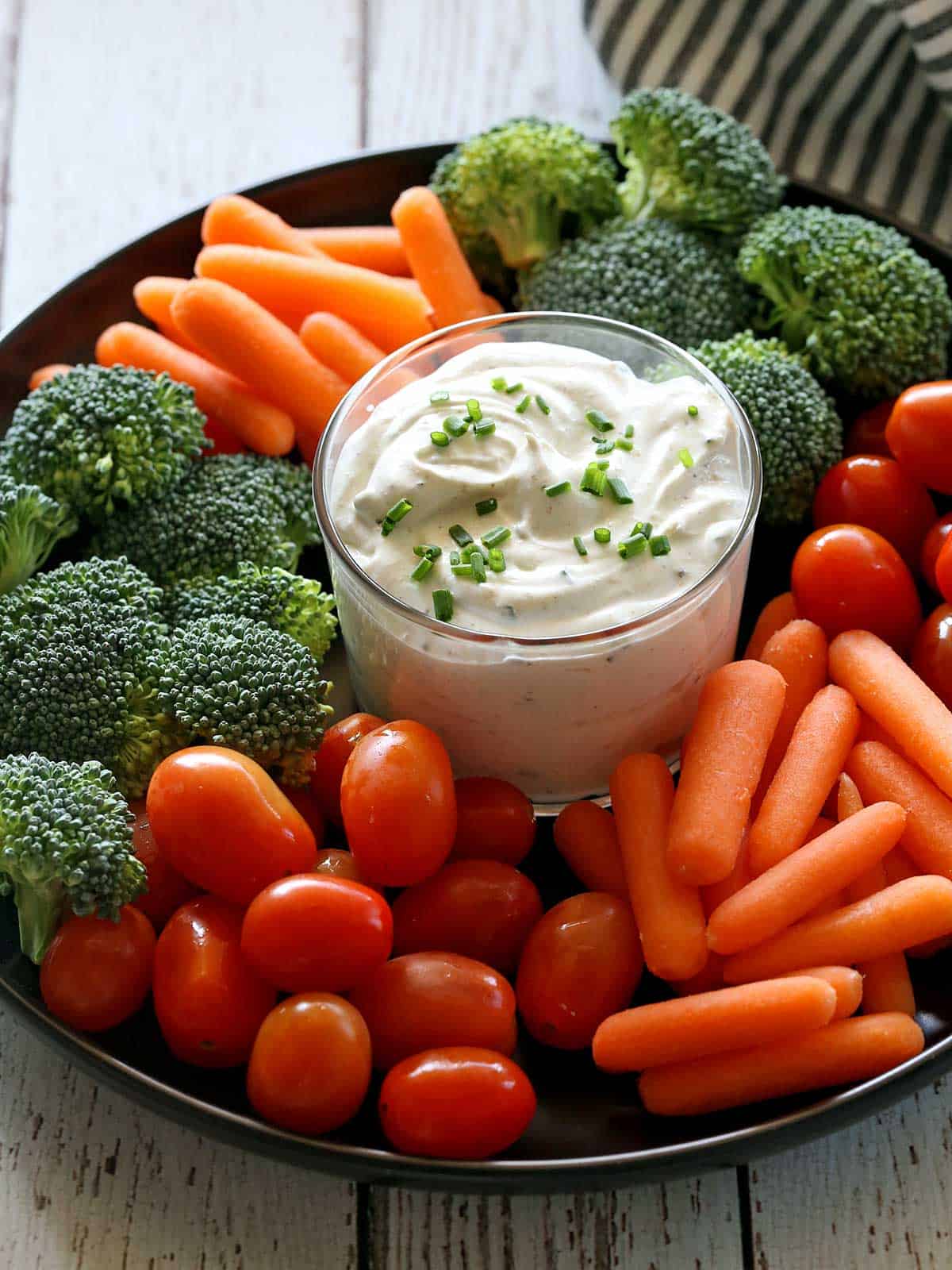 Sour cream dip served with fresh veggies.