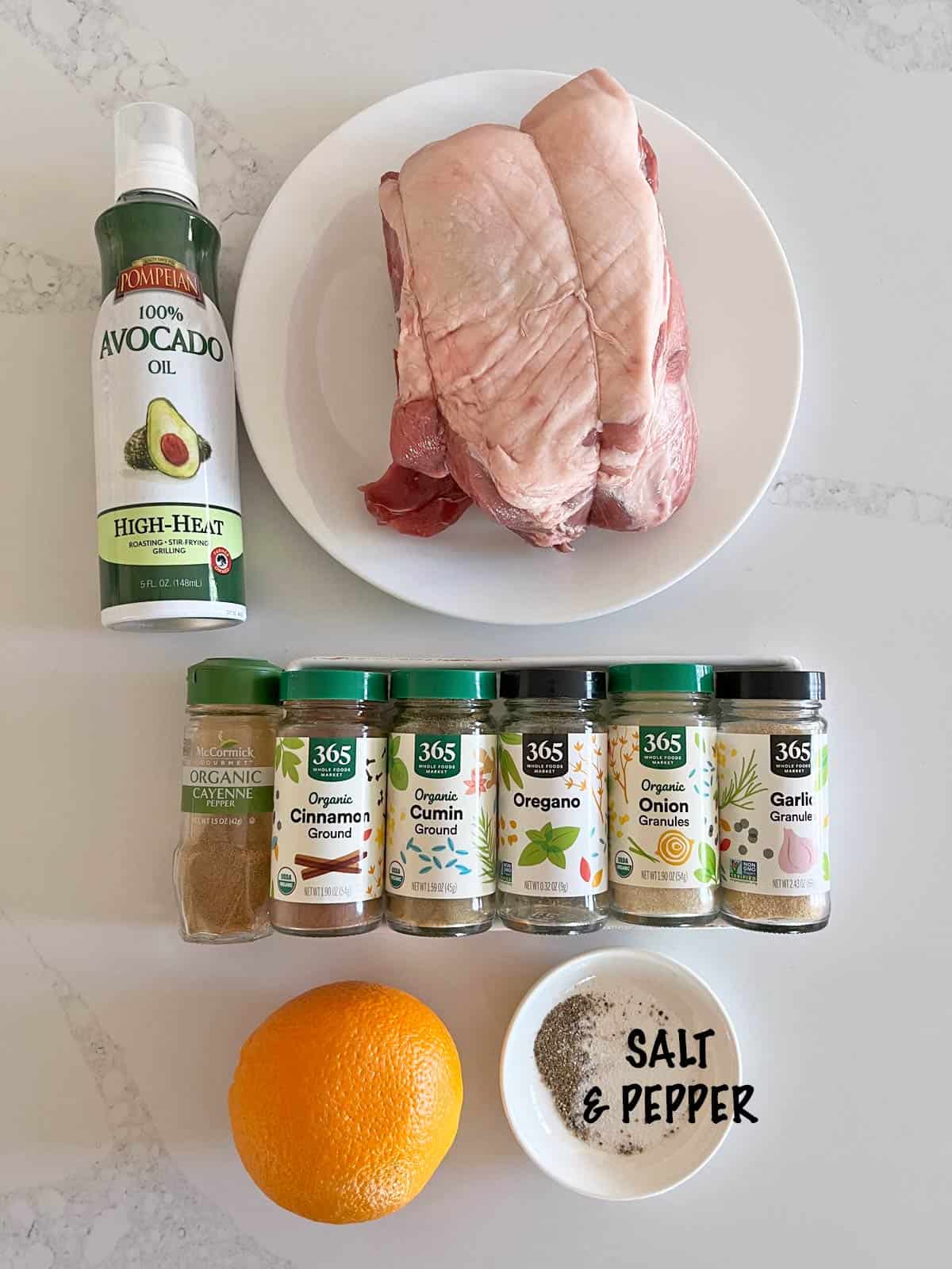 The ingredients needed for cooking carnitas in the slow cooker. 