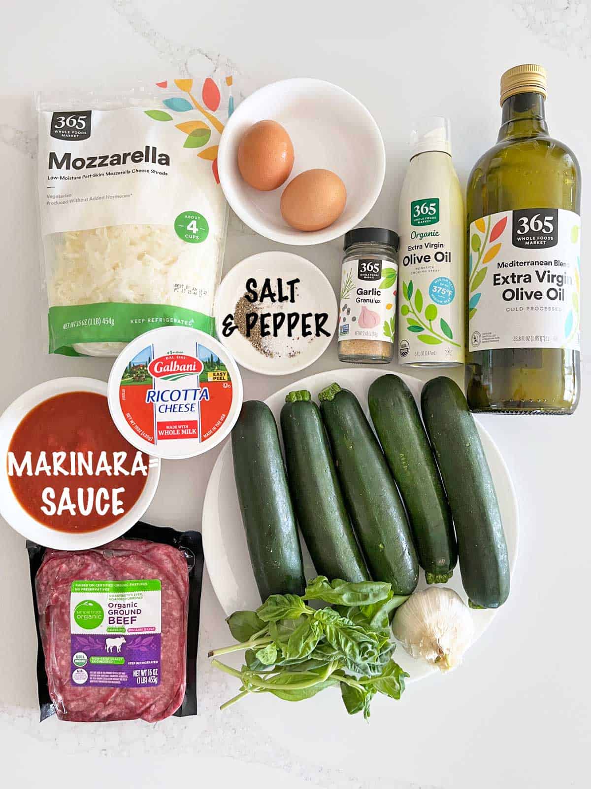 The ingredients needed to make zucchini lasagna. 