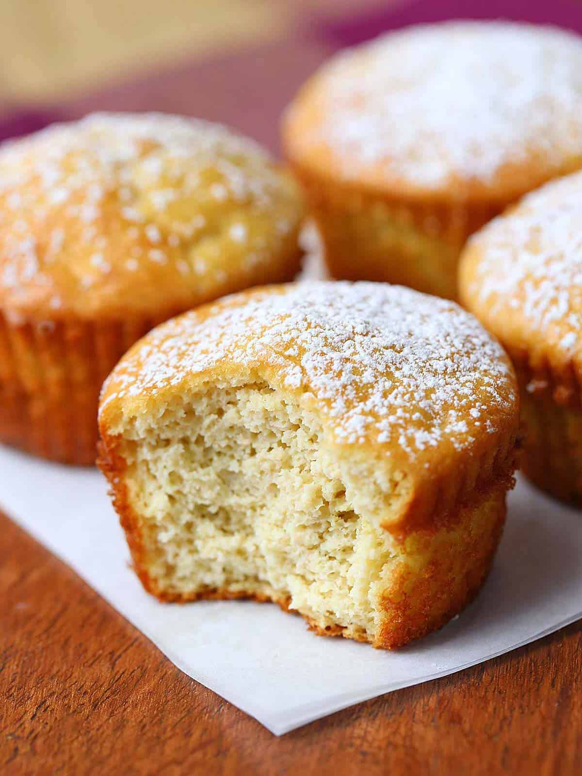 Almond flour muffins dusted with powdered sugar. 